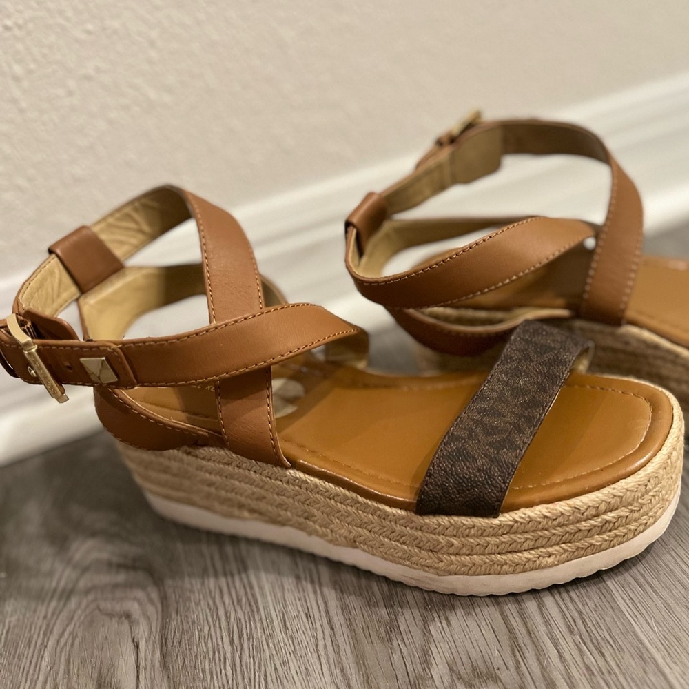 Brown Michael Kors wedge sandals .